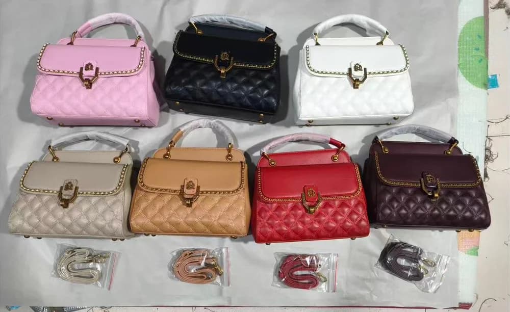 The Studded Bag in all seven colours: Black, White, Beige, Tan, Pink, Red and Burgundy