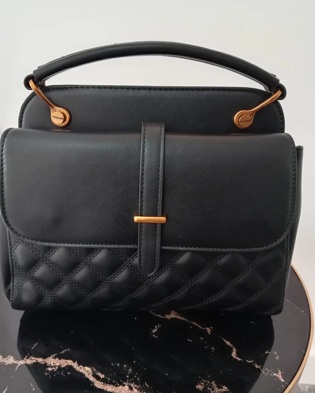 The Studded Bag in Black, back view