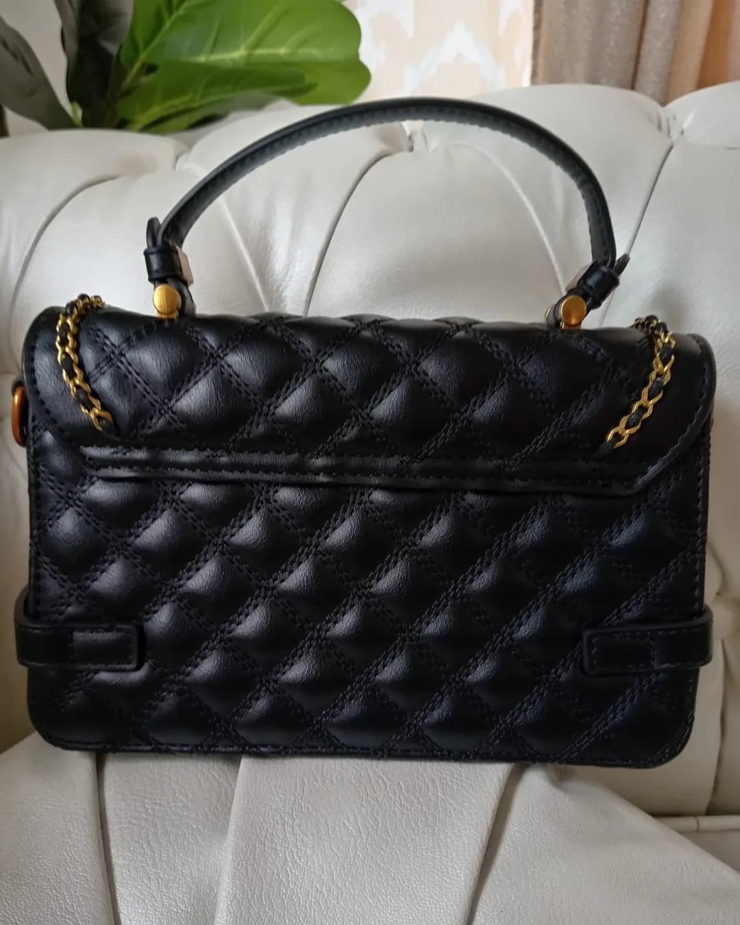 The Buckle Bag in Black, back view