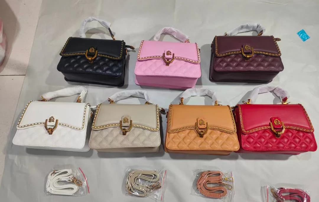 The Chain-Trim Bag in all seven colours: Black, White, Beige, Tan, Pink, Red and Burgundy