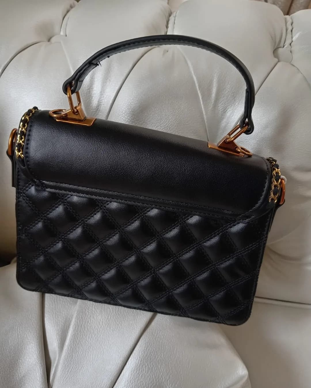 The Chain-Trim Bag in Black, back view