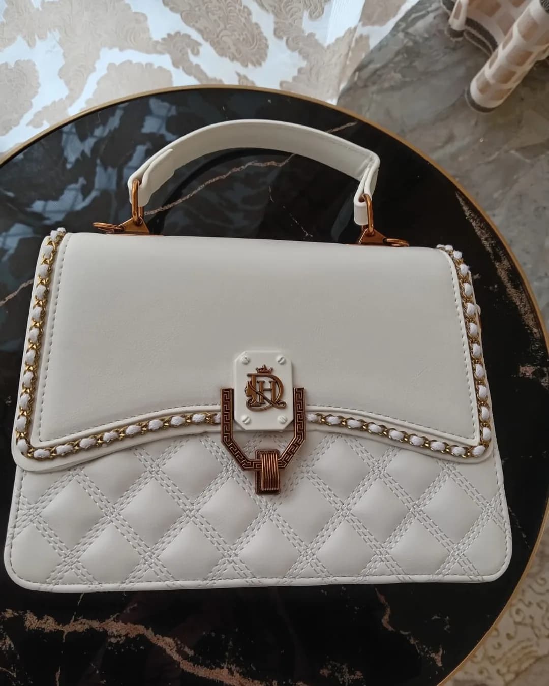 The Chain-Trim Bag in White, front view